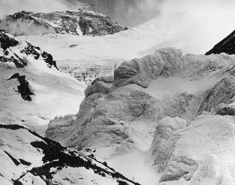 Black and white photo of snowy mountain peaks