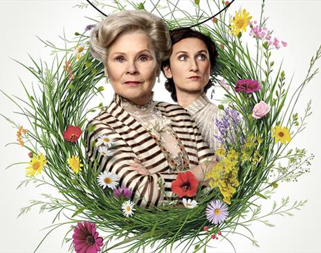 Photos of Imelda Staunton and Bessie Carter both stood in a wreath