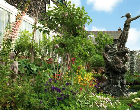 Search for Peter Rabbit in the gardens at The World of Beatrix Potter in Bowness-on-Windermere, Lake District