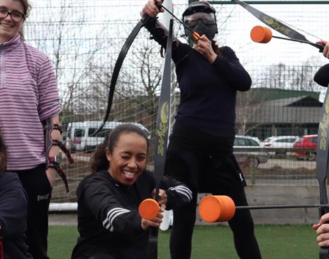 Visitors Playing Archery Tag with Genuine Adventures in the Lake District, Cumbria