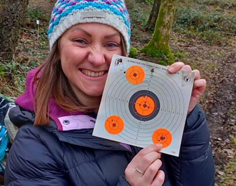 Visitor with Shooting Target with Green Man Survival in Newby Bridge, Lake District