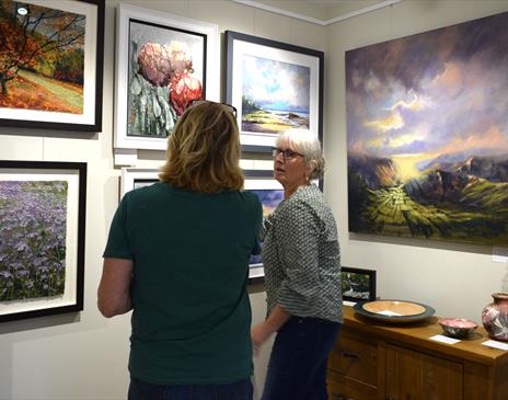 Visitors viewing Art on Display at Gallery North West in Brampton, Cumbria