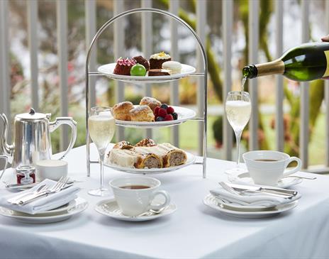 Afternoon Tea Spread with Champagne at Gilpin Lake House in Windermere, Lake District