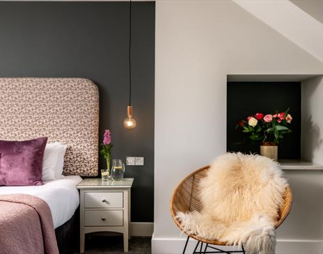 Double bedroom and decor in Hoglet Cottage at Dandelion & Hoglet Cottages, near Dalston, Cumbria