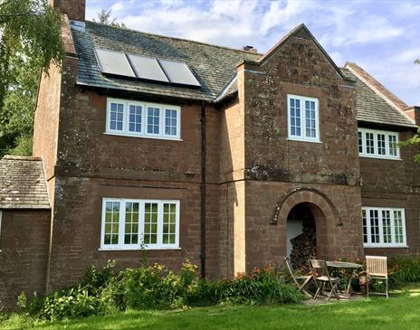 Exterior and Outdoor Seating at Keepers Cottage in Ivegill, Cumbria
