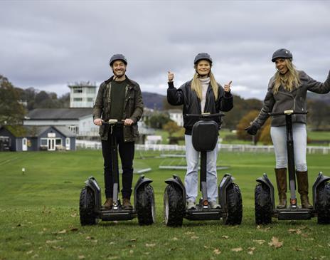 Visitors enjoying an experience with Lakeland Segway in Cartmel, Lake District