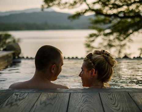 Couple in Infinity Pool at The Spa at Low Wood Bay Resort in Windermere, Lake District