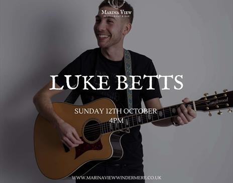 Luke Betts playing guitar
