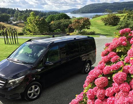 Minibus with a Scenic Lake District Background, from Lakeside Travel Services in the Lake District, Cumbria