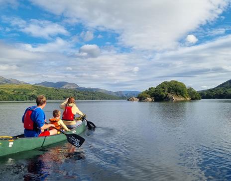 Visitors on a Guided Canoe Trip with Path to Adventure in Coniston, Lake District