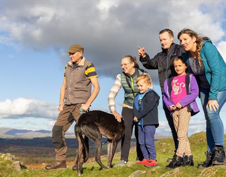 Family on a Scenic Walk near 
Park Cliffe Camping & Caravan Estate in Windermere, Lake District