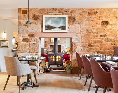 Dining room at the restaurant at Pentonbridge Inn in Penton, Cumbria