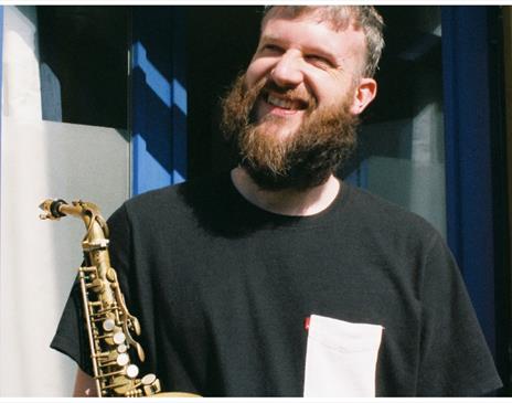 Photo of Sam Newbould for a performance at Brewery Arts in Kendal, Cumbria