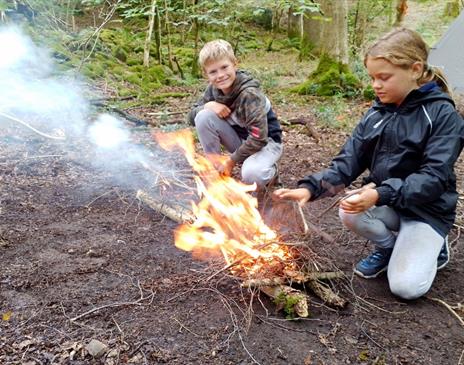 Learn to Make and Safely Manage Fire with Green Man Survival