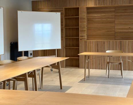 Meeting room layout with whiteboards at The Hub at The Heaning Estate in Windermere, Lake District