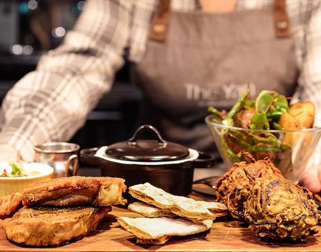 Server Carrying a Food Platter at The Yan at Broadrayne in Grasmere, Lake District