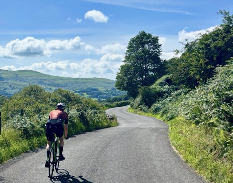 Visitor on a Guided Cycling Tour with Ultimate Cycling Adventures in the Lake District, Cumbria