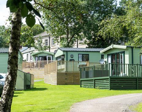 Exteriors of holiday homes for sale at Waterfoot Park in Pooley Bridge, Lake District