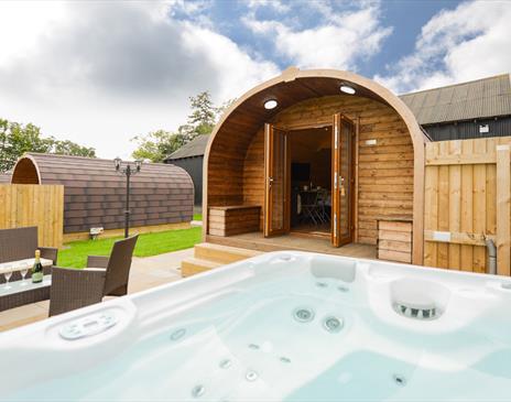 Exterior of Wellington Farm Glamping Pod, with Outdoor Seating and Hot Tub, in Cockermouth, Cumbria