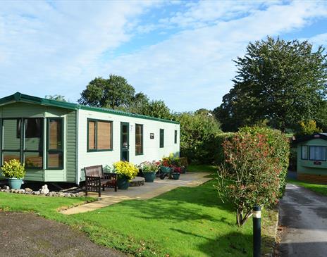 Caravan exteriors at Woodclose Caravan Park in Kirkby Lonsdale, Cumbria