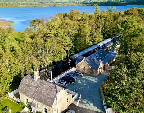 Aerial Photo of Bassenthwaite Lake Station & Carriage Cafe, with Bassenthwaite Lake in the Background, in the Lake District, Cumbria