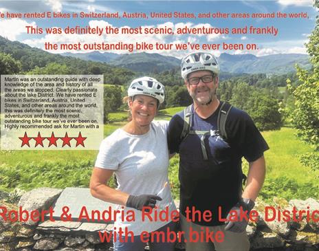 Couple on a guided cycle tour with EMBR Adventures in the Lake District, Cumbria, with a review written on the image