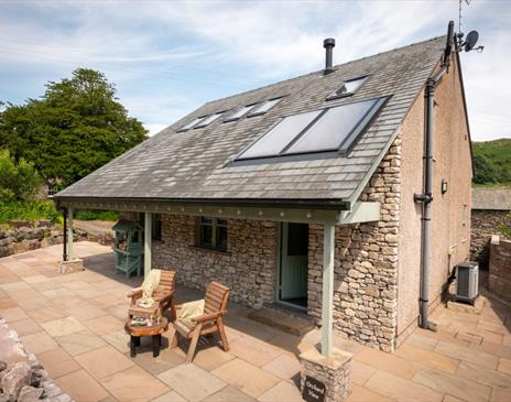 Exterior and patio seating at Ellenboro House in Newton-in-Cartmel, Lake District