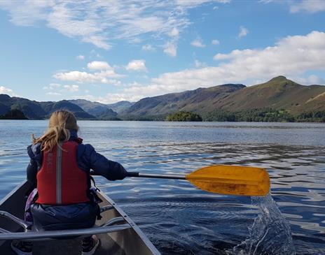 Visitor canoeing with Newlands Adventure Centre in the Lake District, Cumbria