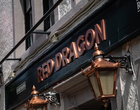 Exterior signage at the Red Dragon Inn in Kirkby Lonsdale, Cumbria