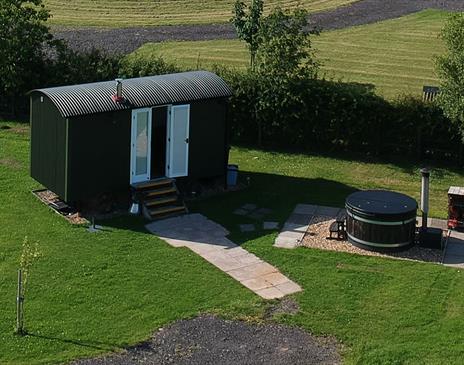 Exterior and Hot Tub at Reiver's Retreat at Low Moor Head Farm in Longtown, Cumbria