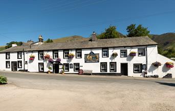 Exterior and Flowers in Bloom at The Horse and Farrier Inn in Threlkeld, Lake District