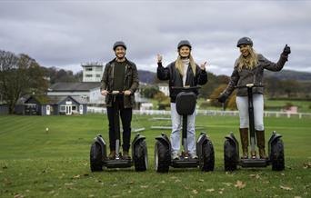 Visitors enjoying an experience with Lakeland Segway in Cartmel, Lake District