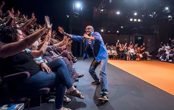 A Performer Interacting with the Audience at Every Brilliant Thing at Theatre by the Lake in Keswick, Lake District