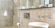 Ensuite bathroom with shower at Hazel Bank Country House Hotel in Rosthwaite, Lake District