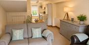 Lounge area, dining area and kitchen in Number 11 at Howgills Apartments in Sedbergh, Cumbria