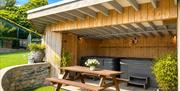 Hot tubs and picnic table at Howgills House near Sedbergh, Cumbria
