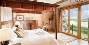 Bedroom with a View at Blencowe Hall near Greystoke, Cumbria