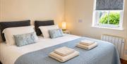 King bedroom in Number 9 at Howgills Apartments in Sedbergh, Cumbria