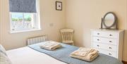 King bedroom in Number 9 at Howgills Apartments in Sedbergh, Cumbria