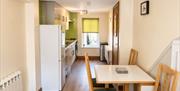 Kitchen and dining area in Number 10 at Howgills Apartments in Sedbergh, Cumbria