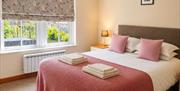 King bedroom in Number 8 at Howgills Apartments in Sedbergh, Cumbria