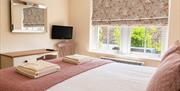 King bedroom in Number 8 at Howgills Apartments in Sedbergh, Cumbria