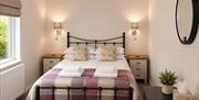 Bedroom 2 with a double bed at Howgills House near Sedbergh, Cumbria