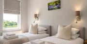 Bedroom 3 with two twin beds at Howgills House near Sedbergh, Cumbria