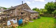 Outdoor sitting area at Upper Crumble Cottage at Crumble Cottages near Cartmel, Lake District