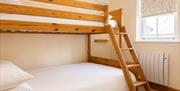 Bunk bedroom in Number 10 at Howgills Apartments in Sedbergh, Cumbria