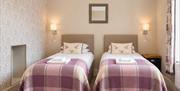 Bedroom 7 with two twin beds at Howgills House near Sedbergh, Cumbria