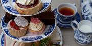 Enjoy afternoon tea at The World of Beatrix Potter in Bowness-on-Windermere, Lake District