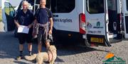 Visitors on a Walking Holiday with Coast to Coast Packhorse in the Lake District, Cumbria