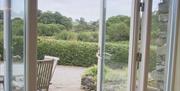 Garden and outside seating at Pheasant Cottage at Wall Nook Cottages near Cartmel, Cumbria